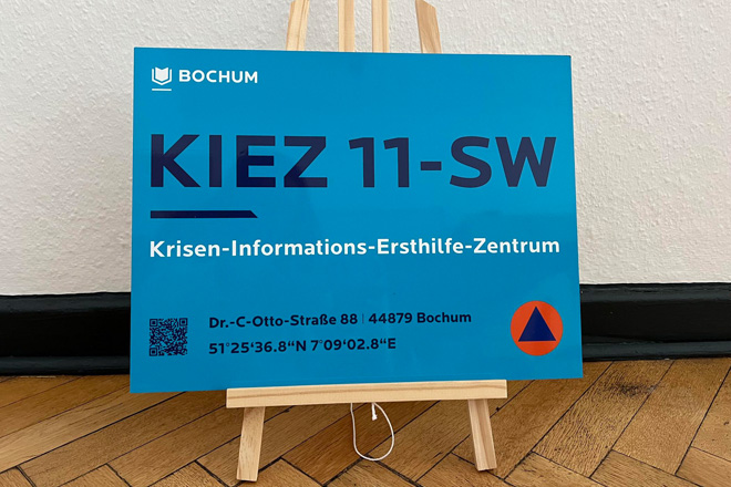 Schild mit der Aufschrift "KIEZ 11-SW"